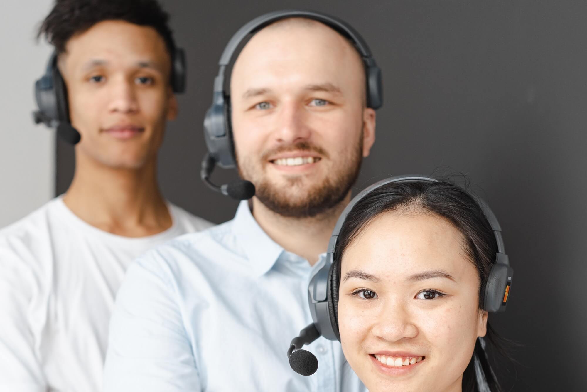 Team members with headsets